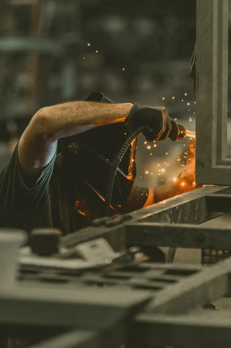 Welding detail in a fabrication workshop