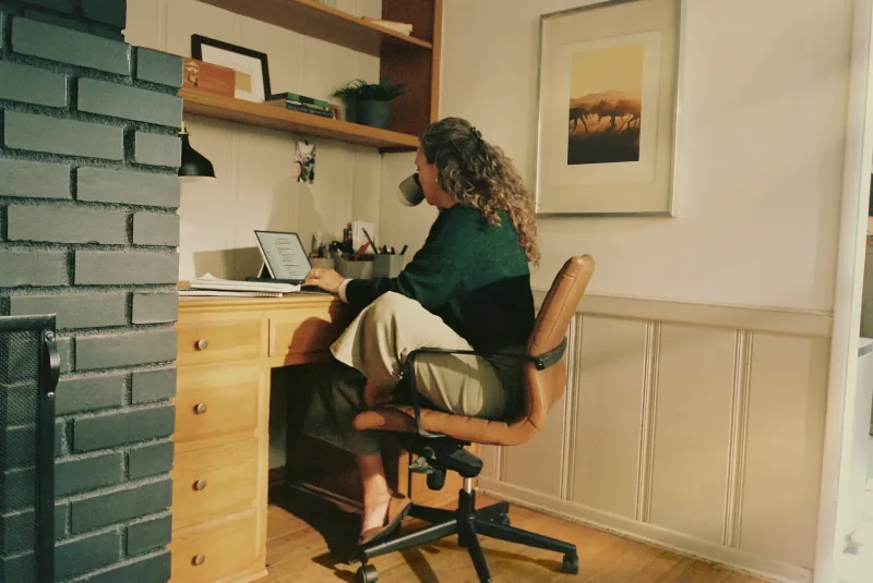 Consultant at a laptop in a home office